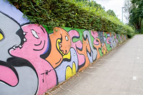 Graffitikunstwerk fietstunnel Julianapark 'De Tijdpoort'